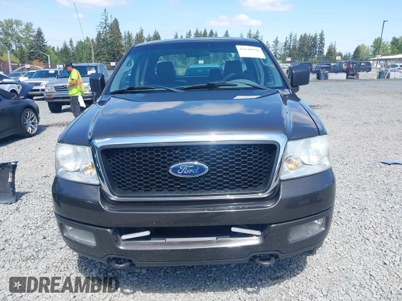2005 Ford F-150 STX with VIN 1FTRX14W35FB18409, listed as a IAAI auction lot 42140190 with 209,198 mi miles and . Bid and sale history available at carsss.com. Image 12.