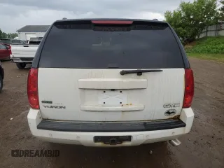 2011 GMC Yukon SLT z VIN 1GKS2CE00BR150352, wystawiony jako Copart lot #61031085 z przebiegiem 258 142 mil mil oraz Czysty tytuł • Clean title. Historia ofert i sprzedaży dostępna na DreamBid. Obrazek 6.