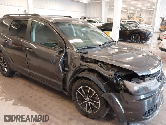 2018 Dodge Journey SE with VIN 3C4PDCAB9JT428917, listed as a IAAI auction lot 41578750 with 136,886 mi miles and . Bid and sale history available at DreamBid. Image 6.