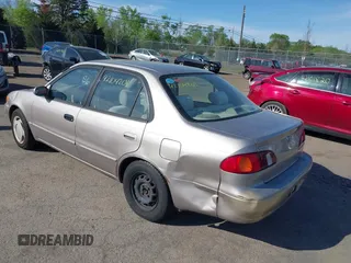 1998 Toyota Corolla VE z VIN 2T1BR18E9WC045442, wystawiony jako IAAI lot #42104201 z przebiegiem 243 256 mil mil oraz . Historia ofert i sprzedaży dostępna na DreamBid. Obrazek 3.