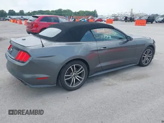 2016 Ford Mustang EcoBoost Premium with VIN 1FATP8UH5G5268939, listed as a IAAI auction lot 39955368 with 106,676 mi miles and . Bid and sale history available at carsss.com. Image 4.