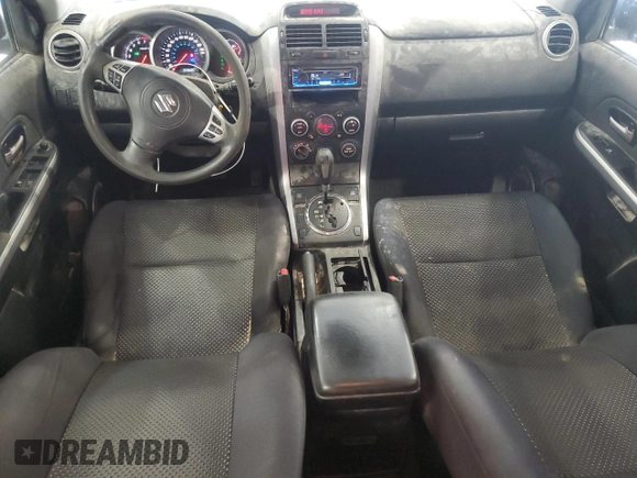 2008 Suzuki Grand Vitara w/Spare & Cargo Covers z VIN JS3TD941584102389, wystawiony jako Copart lot #55044795 z przebiegiem 193 680 mil mil oraz Szkoda całkowita • Salvage title. Historia ofert i sprzedaży dostępna na DreamBid. Obrazek 8.