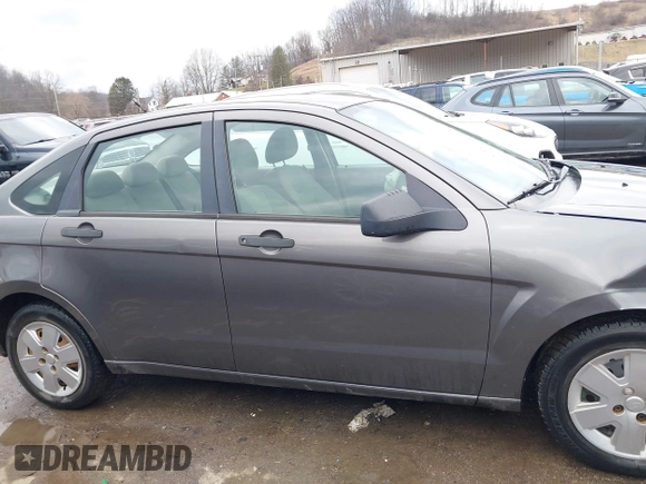 2009 Ford Focus S with VIN 1FAHP34N89W211162, listed as a IAAI auction lot 41677415 with 94,597 mi miles. Bid and sale history available at carsss.com. Image 14.