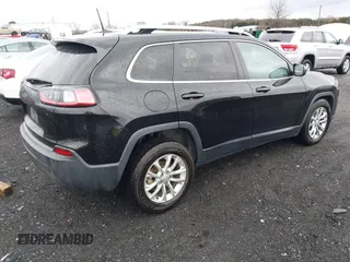 2019 Jeep Cherokee Latitude with VIN 1C4PJLCBXKD357403, listed as a IAAI auction lot 41606497 with 104,102 mi miles and . Bid and sale history available at carsss.com. Image 4.