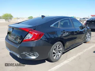 2018 Honda Civic EX with VIN 19XFC2F74JE021802, listed as a IAAI auction lot 42031745 with 102,986 mi miles and . Bid and sale history available at DreamBid. Image 4.