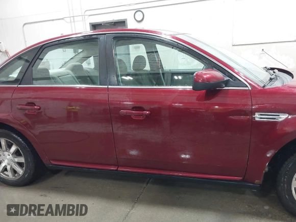 2008 Ford Taurus SEL with VIN 1FAHP27W38G172116, listed as a IAAI auction lot 41824616 with 176,864 mi miles. Bid and sale history available at carsss.com. Image 14.