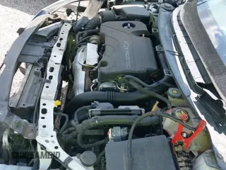 2017 Chevrolet Cruze Premier z VIN 3G1BF6SM0HS603053, wystawiony jako IAAI lot #42439222 z przebiegiem Nie podano mil oraz . Historia ofert i sprzedaży dostępna na DreamBid. Obrazek 25.