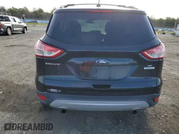2013 Ford Escape SE with VIN 1FMCU0GXXDUC91959, listed as a Copart auction lot 51189605 with 146,718 mi miles and Clean Title. Bid and sale history available at carsss.com. Image 6.