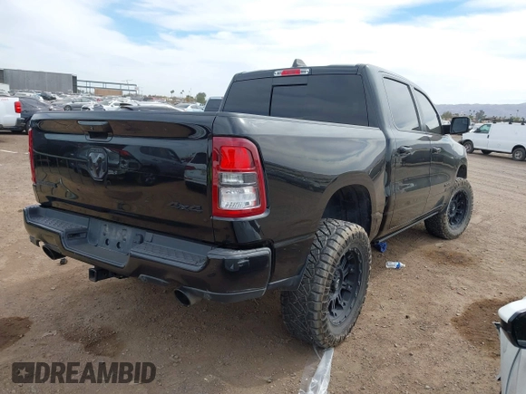 2019 Ram 1500 Big Horn/Lone Star with VIN 1C6SRFFT0KN751969, listed as a IAAI auction lot 41731290 with 127,111 mi miles. Bid and sale history available at carsss.com. Image 4.