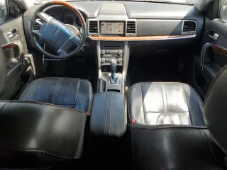 2012 Lincoln MKZ z VIN 3LNHL2JC9CR823251, wystawiony jako Copart lot #57848645 z przebiegiem 237 274 mil mil oraz Szkoda całkowita • Salvage title. Historia ofert i sprzedaży dostępna na DreamBid. Obrazek 8.