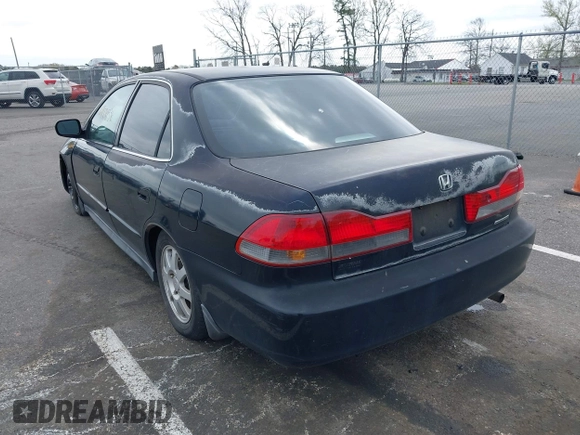 2002 Honda Accord SE z VIN 1HGCG66812A084949, wystawiony jako IAAI lot #42081536 z przebiegiem 309 920 mil mil oraz . Historia ofert i sprzedaży dostępna na DreamBid. Obrazek 3.