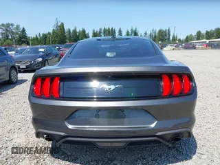 2020 Ford Mustang EcoBoost z VIN 1FA6P8TH9L5167587, wystawiony jako IAAI lot #42407141 z przebiegiem 38 757 mil mil oraz . Historia ofert i sprzedaży dostępna na DreamBid. Obrazek 17.
