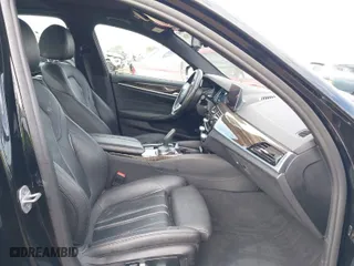 2019 BMW 5 Series 530e iPerformance with VIN WBAJA9C59KB389304, listed as a IAAI auction lot 41562928 with 64,137 mi miles. Bid and sale history available at carsss.com. Image 5.