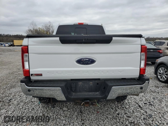2017 Ford Super Duty F-250 SRW Lariat with VIN 1FT7W2BT9HEB86457, listed as a Copart auction lot 51059605 with 212,962 mi miles and Salvage Title. Bid and sale history available at carsss.com. Image 6.