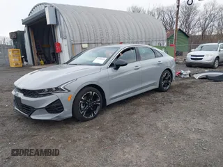 2024 Kia K5 GT-Line z VIN 5XXG64J22RG228095, wystawiony jako IAAI lot #41888510 z przebiegiem 11 927 mil mil oraz . Historia ofert i sprzedaży dostępna na DreamBid. Obrazek 2.
