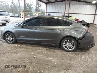 2015 Ford Fusion SE Hybrid with VIN 3FA6P0LU6FR248904, listed as a IAAI auction lot 41556607 with 224,799 mi miles. Bid and sale history available at carsss.com. Image 14.