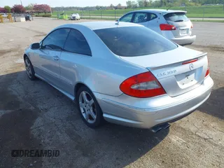 2007 Mercedes-Benz CLK-Class 5.5L with VIN WDBTJ72H97F209555, listed as a IAAI auction lot 42081006 with 137,436 mi miles. Bid and sale history available at carsss.com. Image 3.