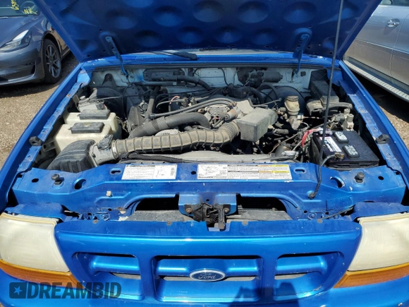 2000 Ford Ranger XL with VIN 1FTZR15V7YPB89028, listed as a Copart auction lot 64226465 with 154,785 mi miles and Clean title. Bid and sale history available at DreamBid. Image 11.