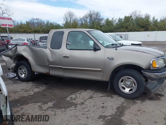 2003 Ford F-150 with VIN 2FTRX17L13CA34390, listed as a IAAI auction lot 41869497 with 114,221 mi miles and . Bid and sale history available at DreamBid. Image 14.
