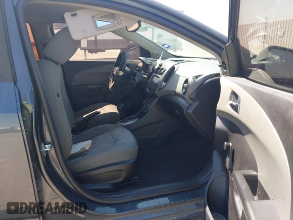 2013 Chevrolet Sonic LS with VIN 1G1JA5SH2D4112064, listed as a IAAI auction lot 42043168 with 215,480 mi miles and . Bid and sale history available at DreamBid. Image 5.