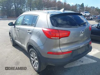 2015 Kia Sportage LX with VIN KNDPBCAC9F7671332, listed as a IAAI auction lot 41595834 with 146,535 mi miles and . Bid and sale history available at carsss.com. Image 3.