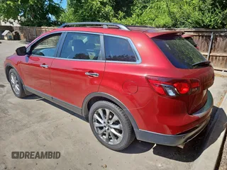 2014 Mazda CX-9 Grand Touring with VIN JM3TB2DA7E0441838, listed as a Copart auction lot 66305865 with 125,585 mi miles and Clean title. Bid and sale history available at DreamBid. Image 3.