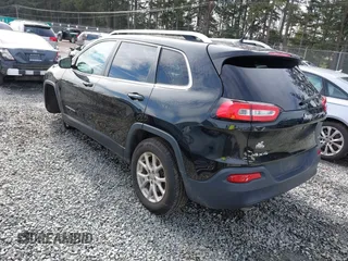 2014 Jeep Cherokee Latitude with VIN 1C4PJMCS0EW169696, listed as a IAAI auction lot 41647691 with 98,919 mi miles. Bid and sale history available at carsss.com. Image 3.