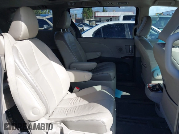 2013 Toyota Sienna XLE with VIN 5TDDK3DCXDS059061, listed as a IAAI auction lot 41777329 with 142,889 mi miles and . Bid and sale history available at DreamBid. Image 8.