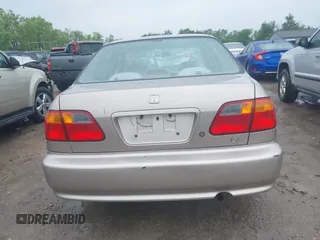 2000 Honda Civic LX z VIN 1HGEJ6678YL039165, wystawiony jako IAAI lot #42441308 z przebiegiem 174 584 mil mil oraz . Historia ofert i sprzedaży dostępna na DreamBid. Obrazek 16.