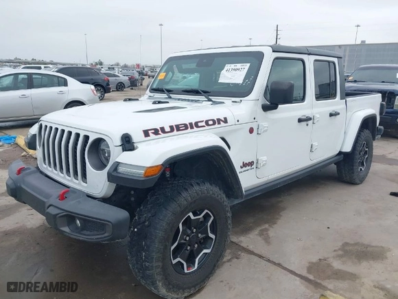 2020 Jeep Gladiator Rubicon with VIN 1C6JJTBG9LL171398, listed as a IAAI auction lot 41390927 with 42,812 mi miles. Bid and sale history available at carsss.com. Image 2.