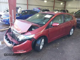 2010 Honda Insight EX z VIN JHMZE2H7XAS001280, wystawiony jako IAAI lot #41982398 z przebiegiem 142 434 mil mil oraz . Historia ofert i sprzedaży dostępna na DreamBid. Obrazek 17.