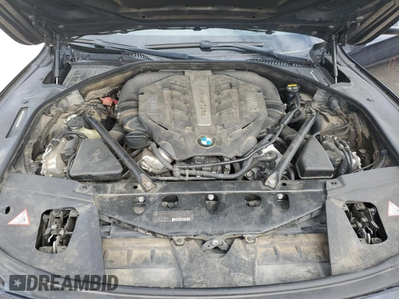 2015 BMW 7 Series 750i with VIN WBAYA8C59FG197642, listed as a Copart auction lot 70282884 with 130,853 mi miles and Salvage title. Bid and sale history available at DreamBid. Image 11.