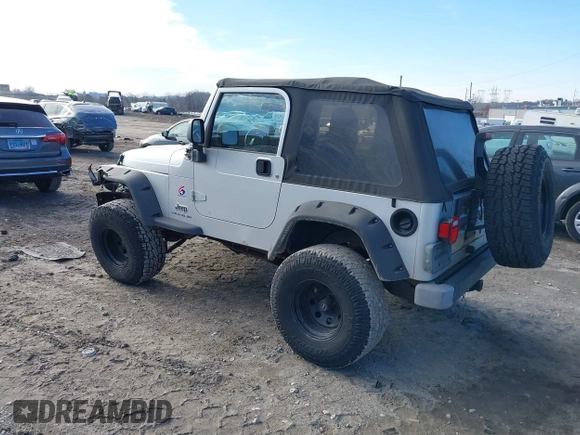 2003 Jeep Wrangler X with VIN 1J4FA39S33P363153, listed as a IAAI auction lot 41584805 with 160,676 mi miles. Bid and sale history available at carsss.com. Image 3.