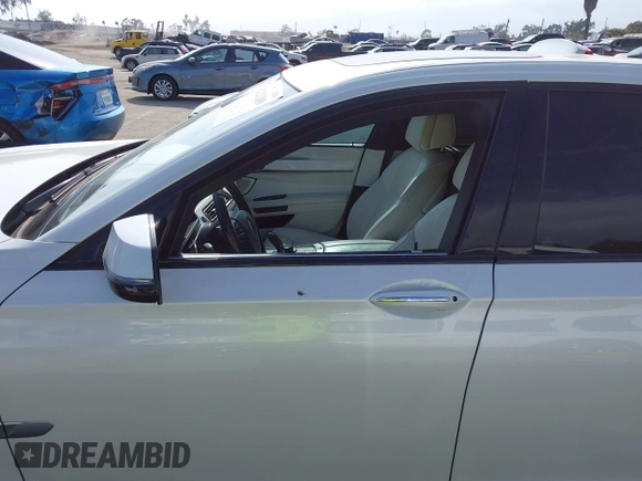 2015 BMW 7 Series 750Li with VIN WBAYE8C52FD785162, listed as a IAAI auction lot 42121389 with 88,783 mi miles and . Bid and sale history available at DreamBid. Image 6.