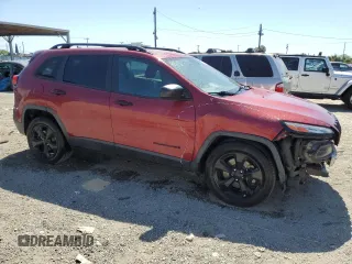 2016 Jeep Cherokee Altitude with VIN 1C4PJMAS5GW349598, listed as a Copart auction lot 56198605 with 148,739 mi miles and Salvage title. Bid and sale history available at DreamBid. Image 4.