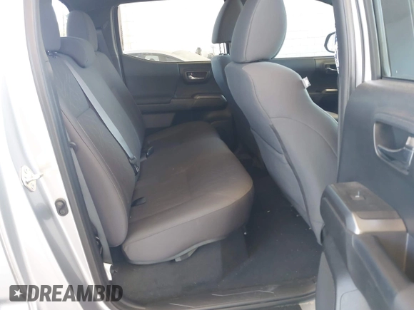 2018 Toyota Tacoma SR with VIN 3TMCZ5ANXJM146284, listed as a IAAI auction lot 42041525 with 103,143 mi miles and . Bid and sale history available at DreamBid. Image 8.