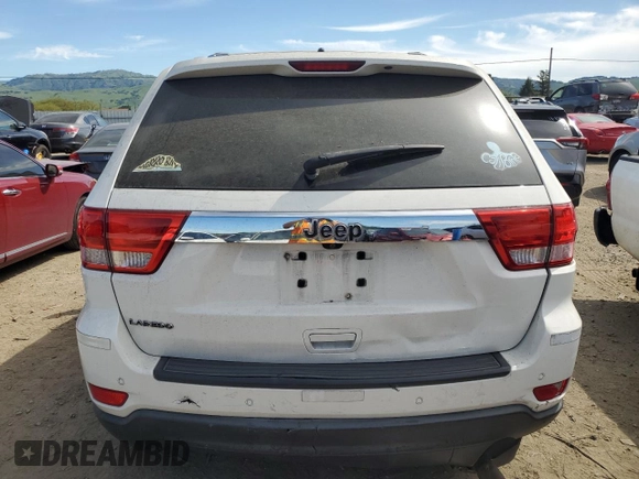 2012 Jeep Grand Cherokee Laredo with VIN 1C4RJEAG0CC222943, listed as a Copart auction lot 52899545 with 153,389 mi miles and Salvage Title. Bid and sale history available at carsss.com. Image 6.