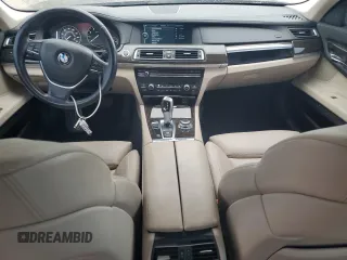 2012 BMW 7 Series 740Li with VIN WBAKB4C59CC576476, listed as a Copart auction lot 55670215 with 100,907 mi miles and Salvage title. Bid and sale history available at DreamBid. Image 8.