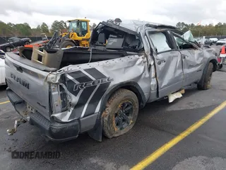 2021 Ram 1500 Rebel with VIN 1C6SRFLT0MN734774, listed as a IAAI auction lot 41075676 with 95,808 mi miles and . Bid and sale history available at DreamBid. Image 4.