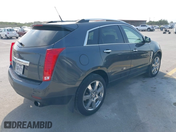 2011 Cadillac SRX Premium Collection with VIN 3GYFNFEY9BS601541, listed as a IAAI auction lot 41950409 with 168,358 mi miles. Bid and sale history available at carsss.com. Image 4.