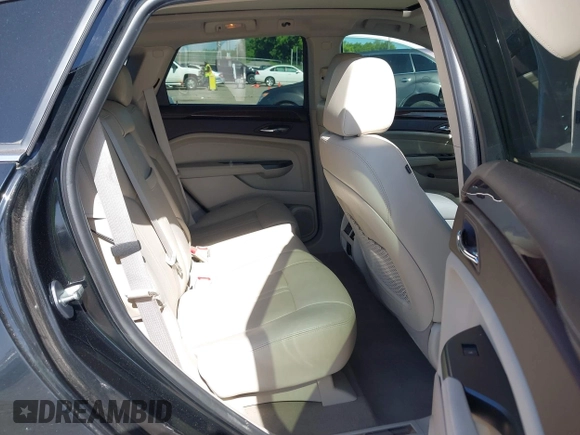 2012 Cadillac SRX Performance Collection with VIN 3GYFNBE39CS656702, listed as a IAAI auction lot 39599535 with 110,860 mi miles and . Bid and sale history available at DreamBid. Image 8.