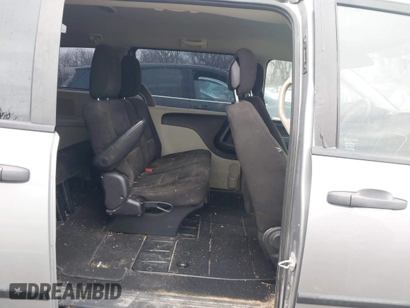 2014 Dodge Grand Caravan American Value with VIN 2C4RDGBG9ER187198, listed as a IAAI auction lot 41669334 with 204,803 mi miles and . Bid and sale history available at DreamBid. Image 8.