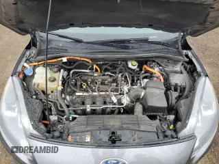 2021 Ford Escape SE Hybrid with VIN 1FMCU9BZ3MUA68658, listed as a Copart auction lot 55977435 with 149,167 mi miles and Salvage title. Bid and sale history available at DreamBid. Image 12.