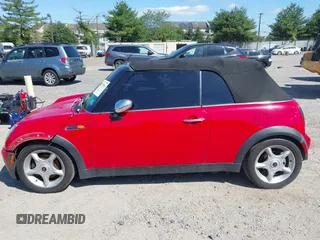 2005 MINI Convertible with VIN WMWRF33445TF62043, listed as a IAAI auction lot 42279363 with 173,067 mi miles and . Bid and sale history available at DreamBid. Image 14.