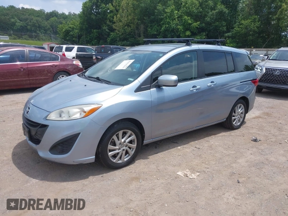 2012 Mazda 5 Sport with VIN JM1CW2BLXC0106748, listed as a IAAI auction lot 42435965 with 153,786 mi miles and . Bid and sale history available at DreamBid. Image 2.