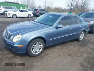 2003 Mercedes-Benz E-Class 3.2L with VIN WDBUF65J43A232053, listed as a IAAI auction lot 41930685 with 74,675 mi miles. Bid and sale history available at carsss.com. Image 2.