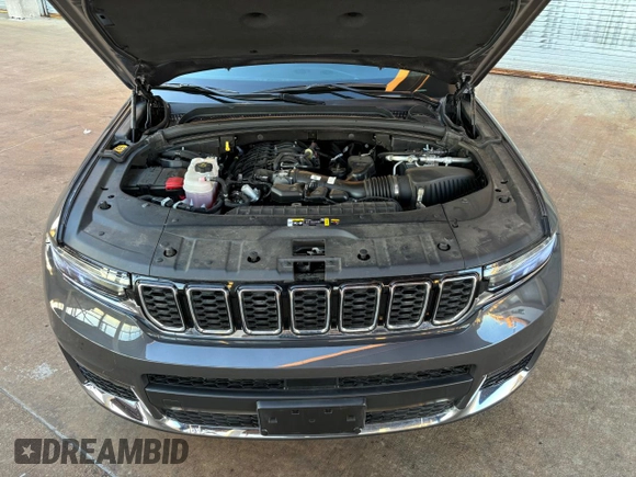 2023 Jeep Grand Cherokee Limited z VIN 1C4RJKBG4P8840711, wystawiony jako Copart lot #56185315 z przebiegiem 8 076 mil mil oraz Szkoda całkowita • Salvage title. Historia ofert i sprzedaży dostępna na DreamBid. Obrazek 13.