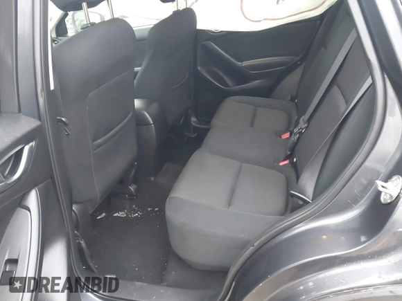 2016 Mazda CX-5 Sport with VIN JM3KE4BY5G0885754, listed as a IAAI auction lot 41103575 with 136,263 mi miles and . Bid and sale history available at carsss.com. Image 8.