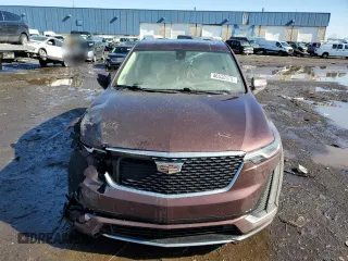 2023 Cadillac XT6 AWD Premium Luxury z VIN 1GYKPDRS0PZ112068, wystawiony jako Copart lot #46538575 z przebiegiem 52 016 mil mil oraz Szkoda całkowita • Salvage title. Historia ofert i sprzedaży dostępna na DreamBid. Obrazek 5.