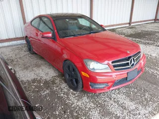 2014 Mercedes-Benz C-Class C 250 with VIN WDDGJ4HB8EG292493, listed as a IAAI auction lot 42032308 with 117,183 mi miles. Bid and sale history available at carsss.com. Image 1.